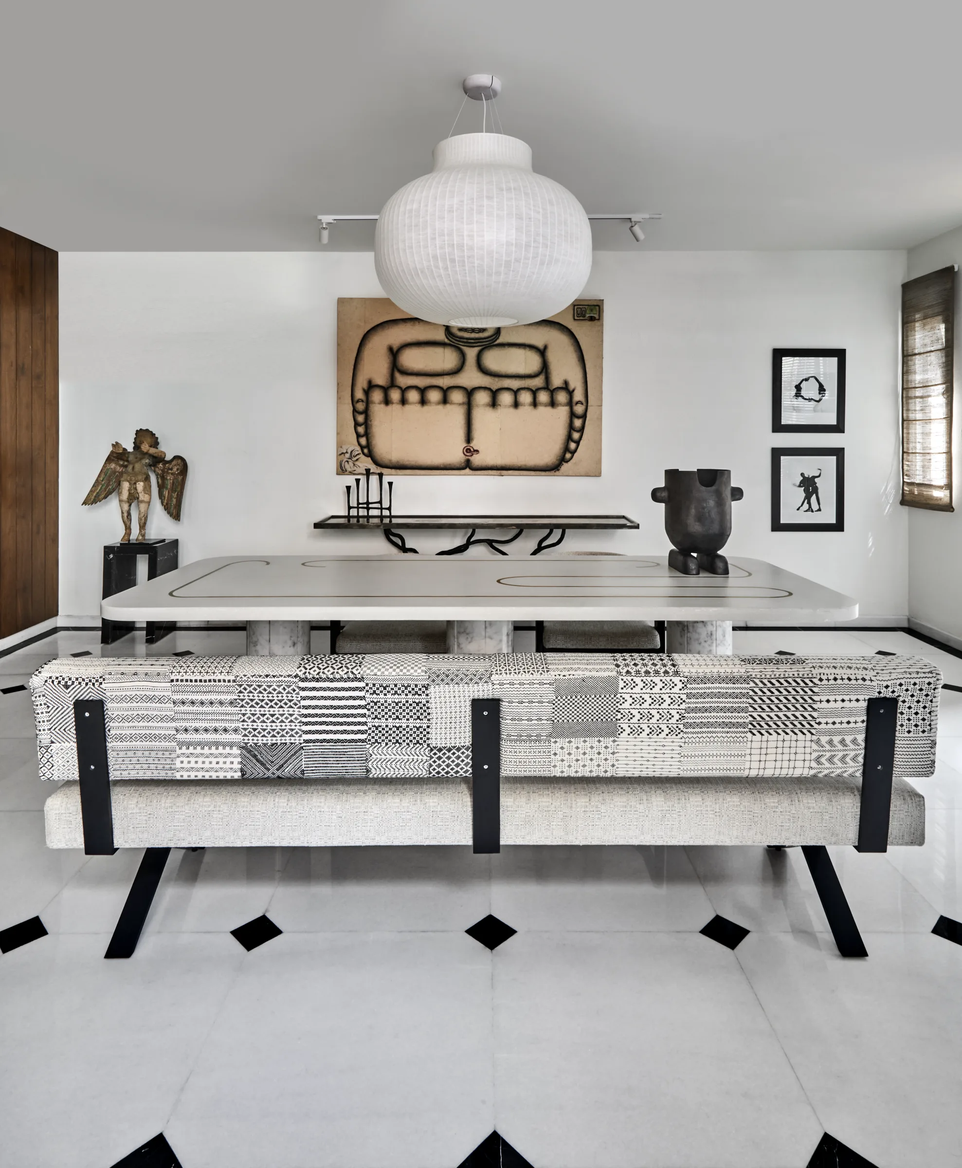 Art-led dining space at Sen Residence by Treelight